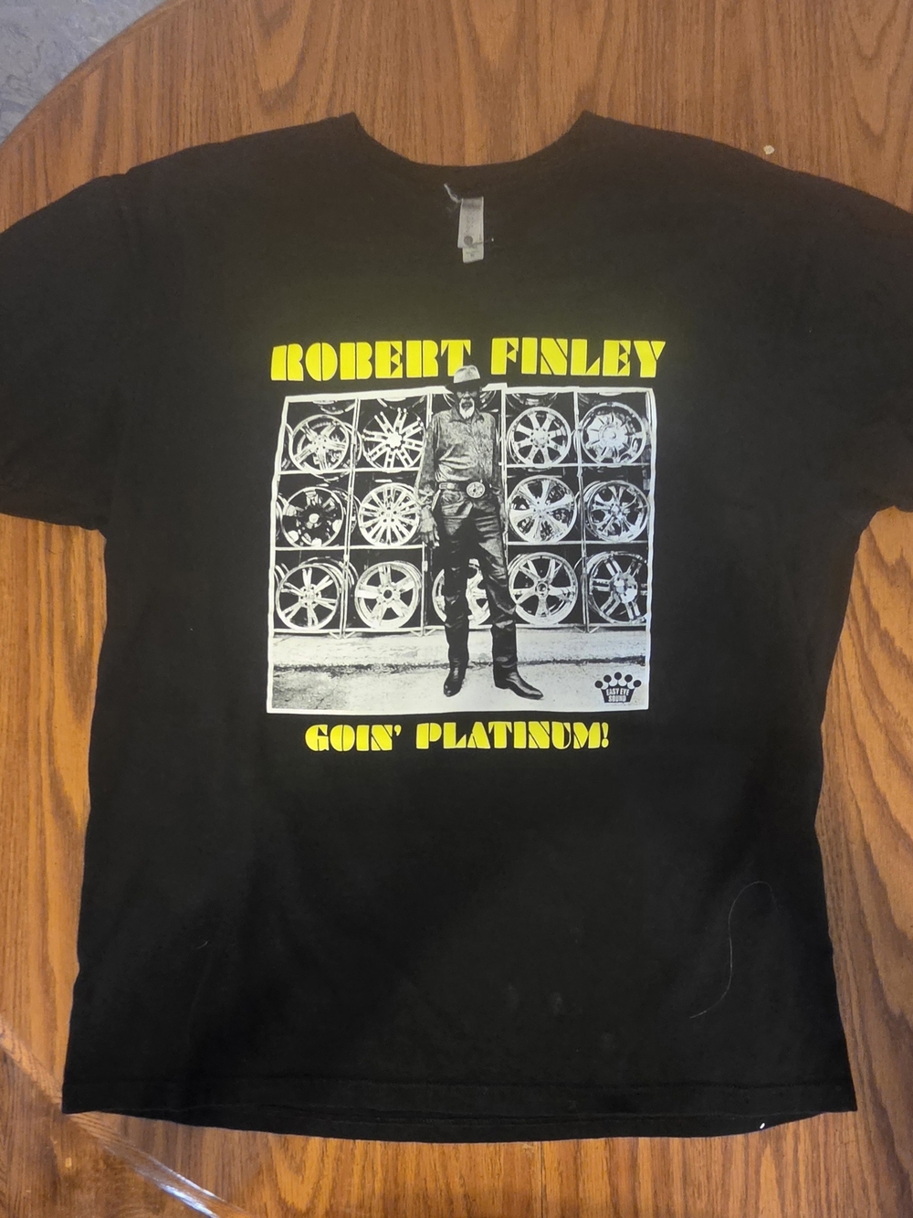 Next Level Apparel Black T‑Shirt with Yellow & White Robert Finley Graphic